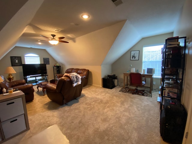 carpeted living room featuring lofted ceiling and ceiling fan