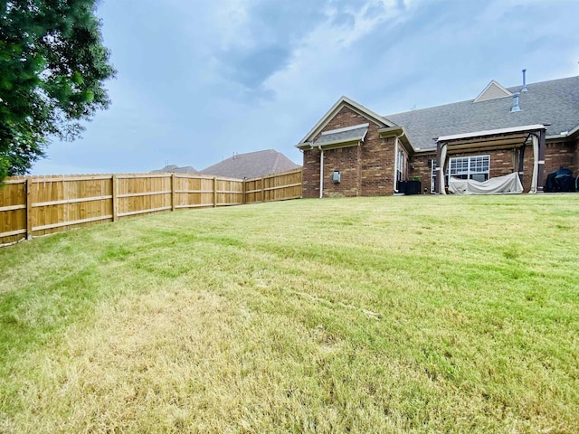 view of yard with fence