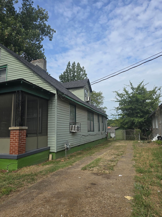 view of property exterior with cooling unit