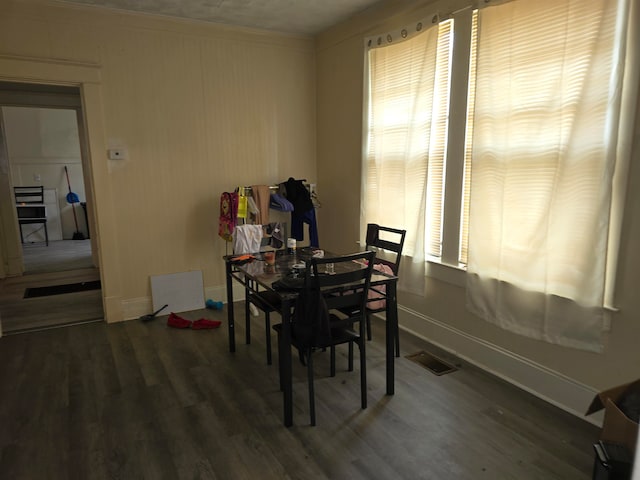 dining room featuring hardwood / wood-style flooring