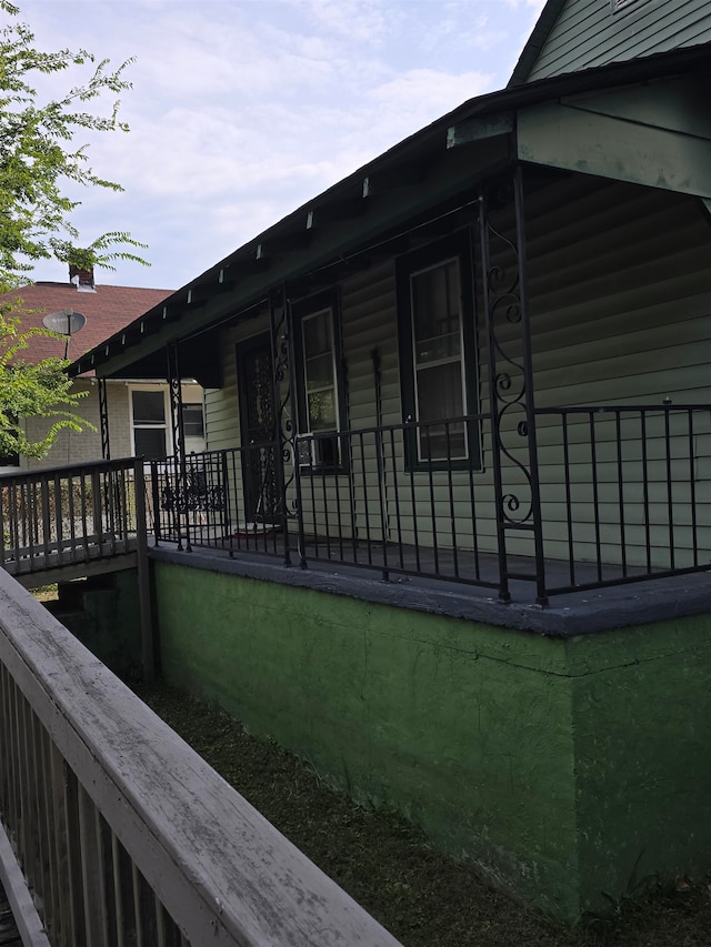 view of home's exterior featuring a porch