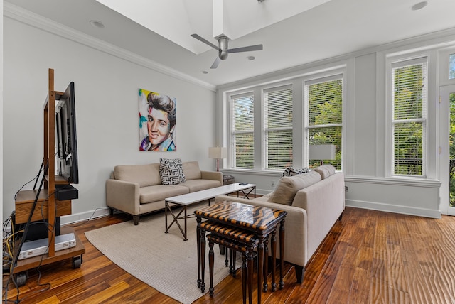 living room featuring baseboards, ornamental molding, recessed lighting, wood finished floors, and a ceiling fan