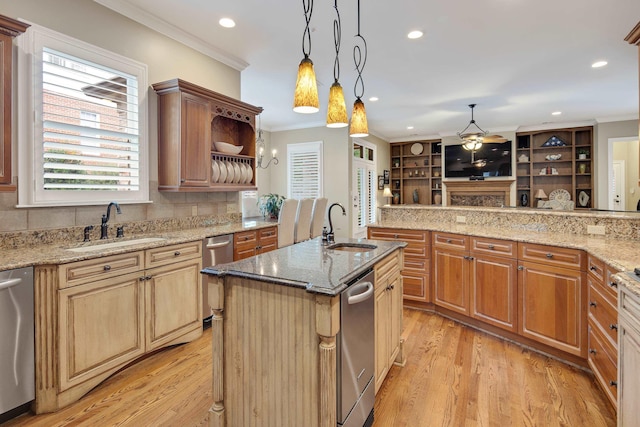 kitchen with ornamental molding, dishwasher, a sink, and open shelves