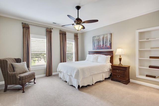 bedroom with light carpet, visible vents, and crown molding