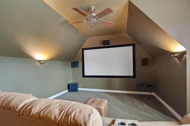 cinema room with carpet floors, ceiling fan, baseboards, and lofted ceiling