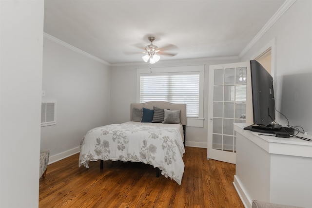 bedroom with crown molding, dark hardwood / wood-style floors, and ceiling fan