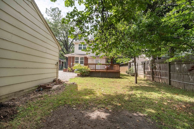 view of yard featuring a wooden deck