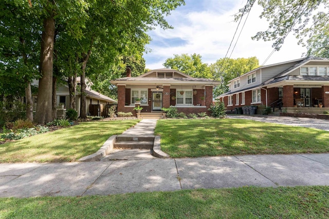 view of front of home with a front yard