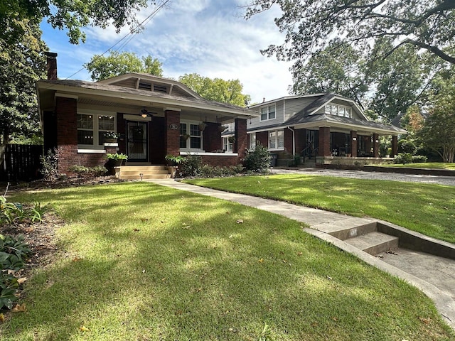 view of front of home featuring a front lawn and a porch