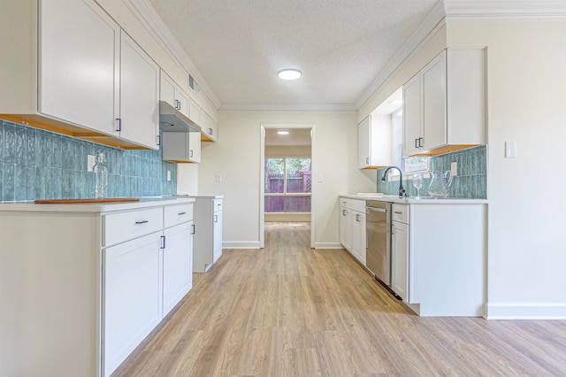 kitchen featuring white cabinets, dishwasher, crown molding, light hardwood / wood-style floors, and sink