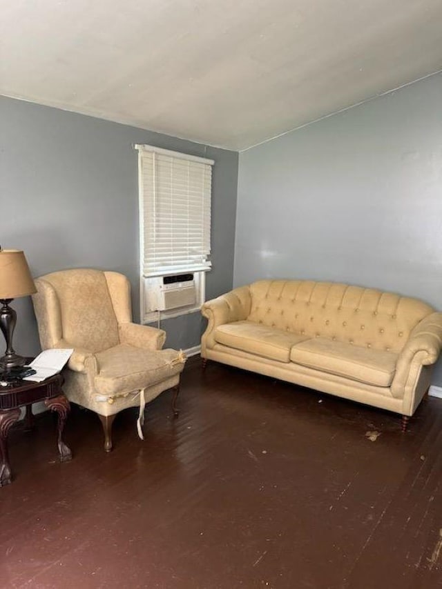 living room featuring cooling unit and dark wood-type flooring