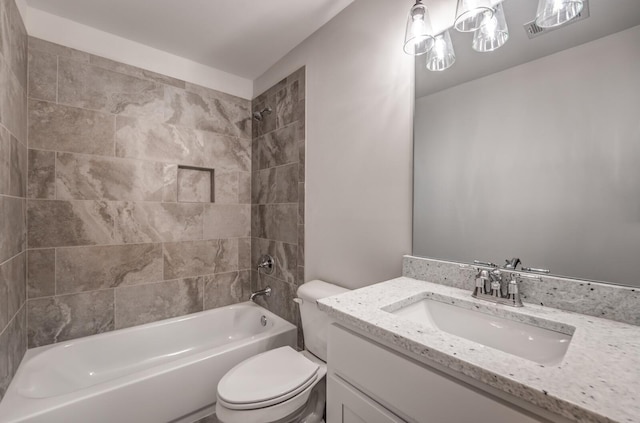 full bath featuring tub / shower combination, toilet, and vanity