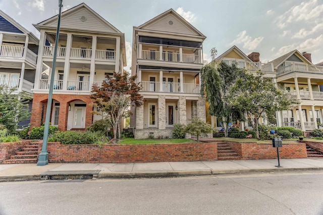 view of front of house featuring a balcony