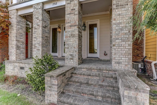 property entrance with central AC unit