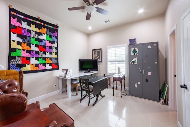 home office with light tile patterned flooring and ceiling fan