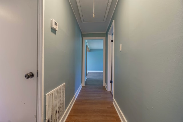 hallway featuring hardwood / wood-style flooring