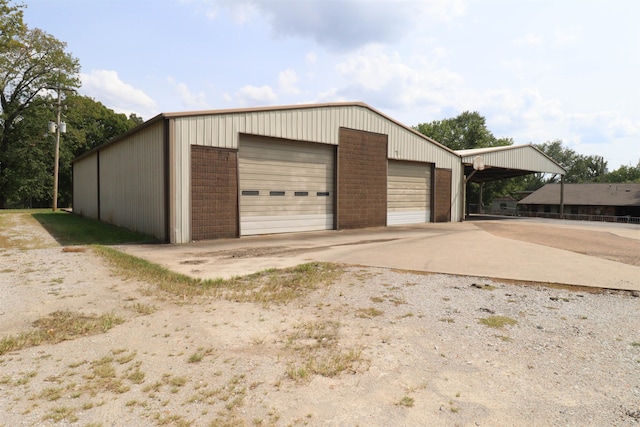 garage with a carport