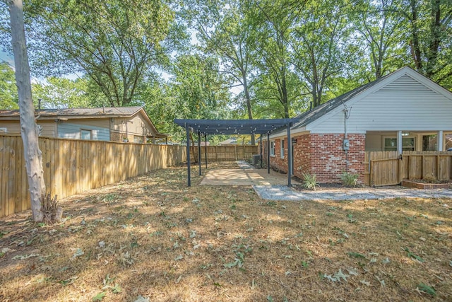 view of yard featuring a pergola and a patio area