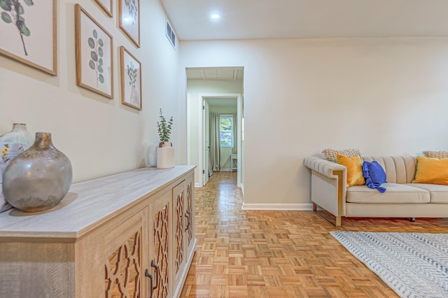 hallway with light parquet floors