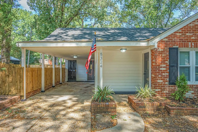 view of front of home with a carport