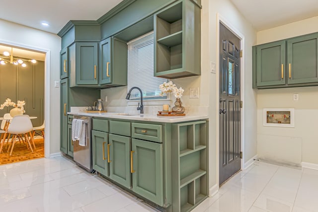 kitchen with green cabinetry, light tile patterned floors, a chandelier, sink, and stainless steel dishwasher