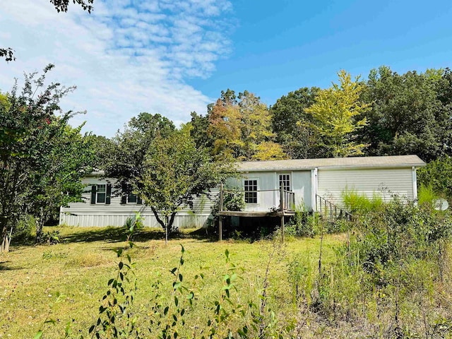 exterior space with a lawn