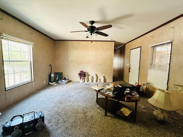 interior space with crown molding, carpet, and ceiling fan