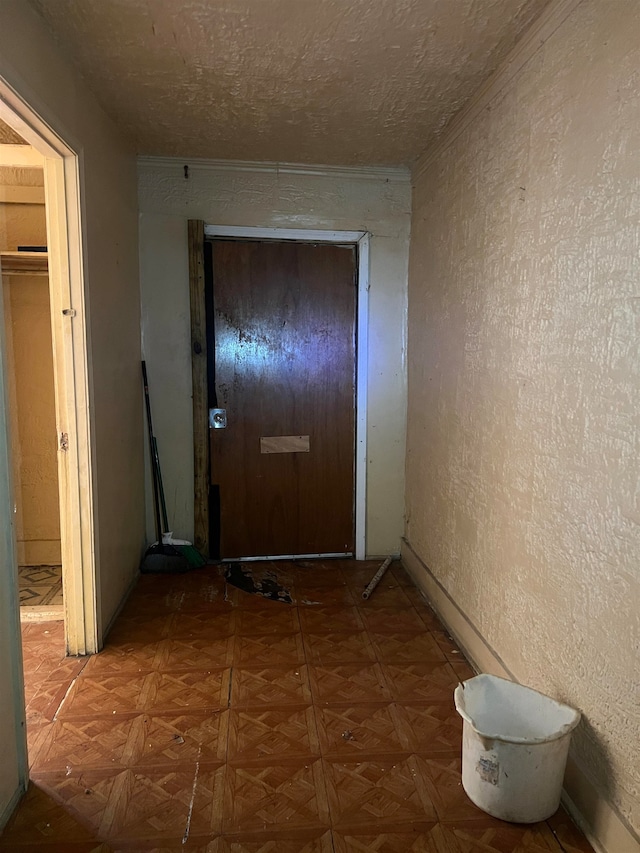 doorway with parquet flooring