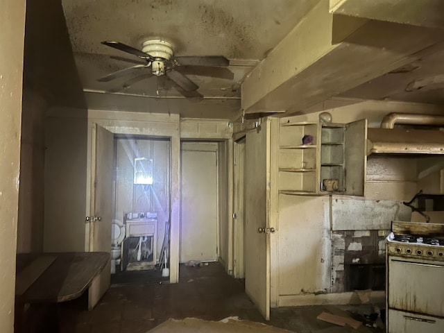 kitchen with ceiling fan and white range with gas cooktop