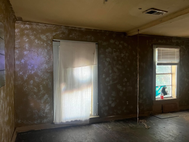 spare room featuring hardwood / wood-style floors