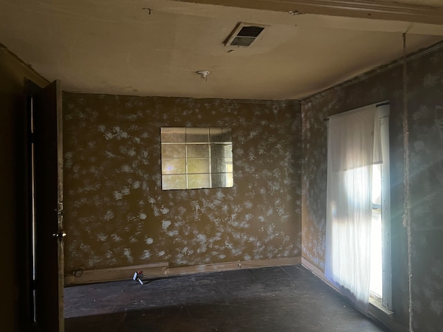 spare room featuring concrete floors