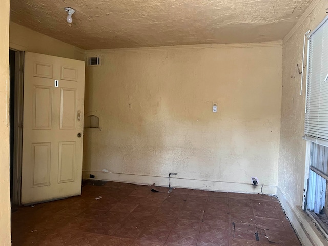 empty room featuring dark hardwood / wood-style flooring