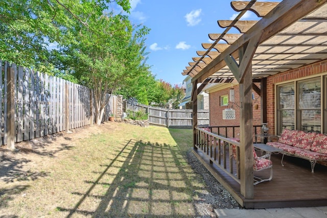 view of yard featuring a pergola and a wooden deck