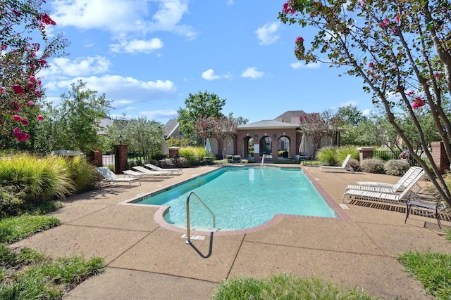 view of pool featuring a patio