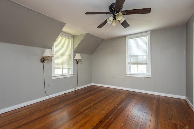 additional living space featuring vaulted ceiling, wood-type flooring, and ceiling fan