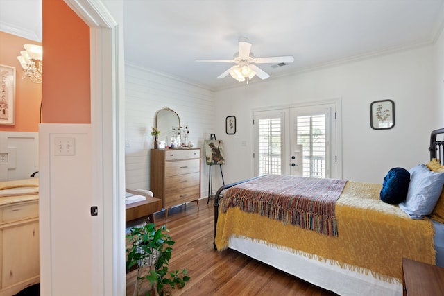 bedroom featuring ornamental molding, access to outside, wood-type flooring, sink, and ceiling fan