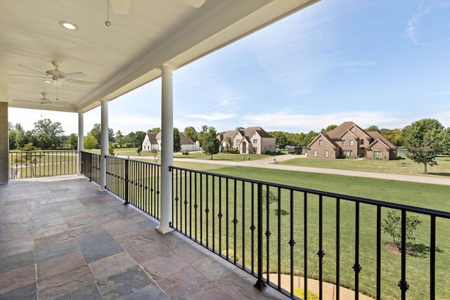 balcony featuring ceiling fan