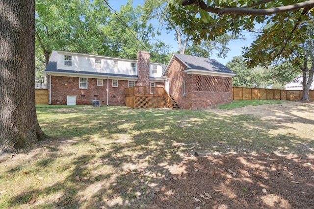 view of yard featuring a wooden deck