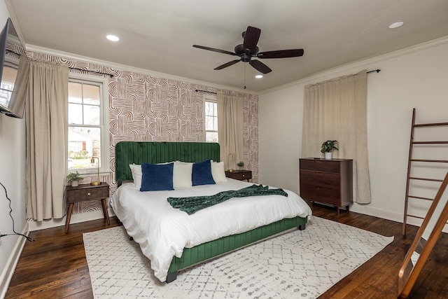 bedroom featuring ceiling fan, dark hardwood / wood-style floors, and crown molding