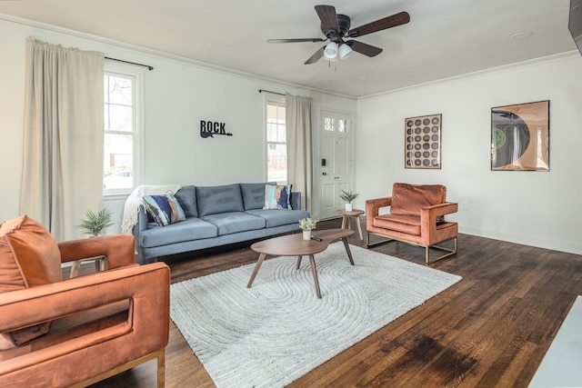 living room featuring ornamental molding, dark hardwood / wood-style flooring, and ceiling fan