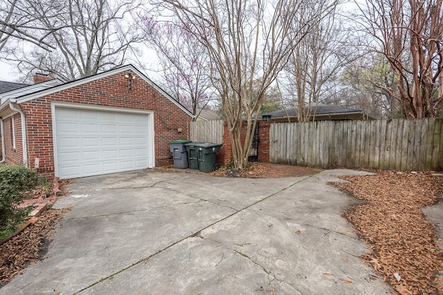 view of side of home with a garage