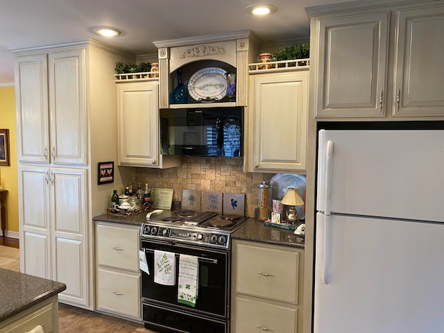 kitchen with crown molding, black appliances, dark stone counters, and decorative backsplash