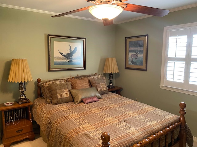 bedroom featuring crown molding and ceiling fan