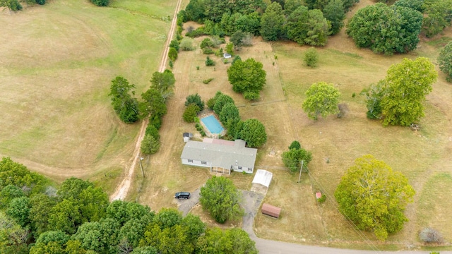 birds eye view of property featuring a rural view