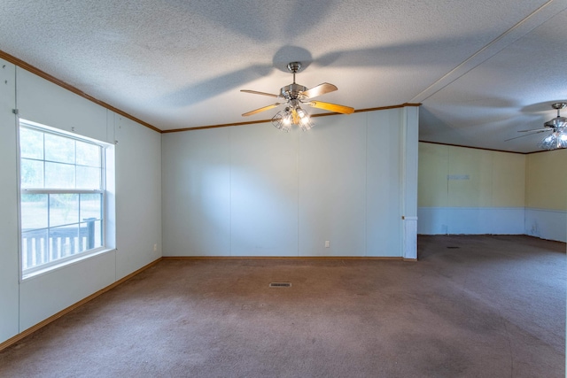 unfurnished room with carpet flooring, ceiling fan, ornamental molding, and a textured ceiling