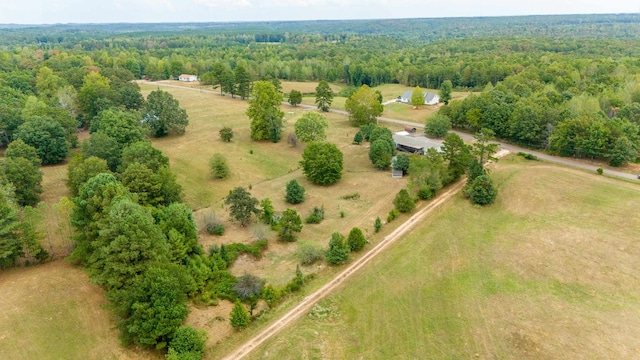 birds eye view of property with a rural view