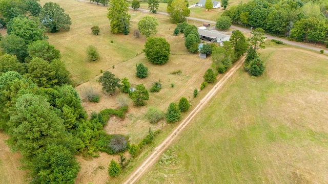 birds eye view of property featuring a rural view