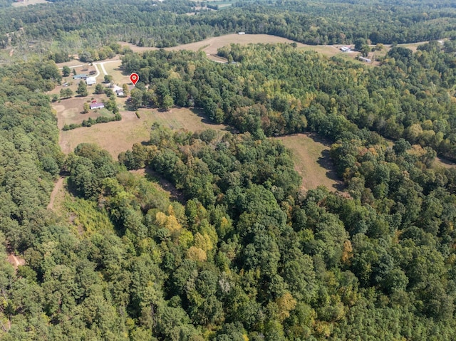 aerial view featuring a view of trees