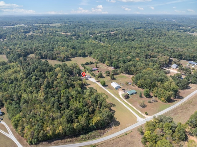 drone / aerial view with a forest view