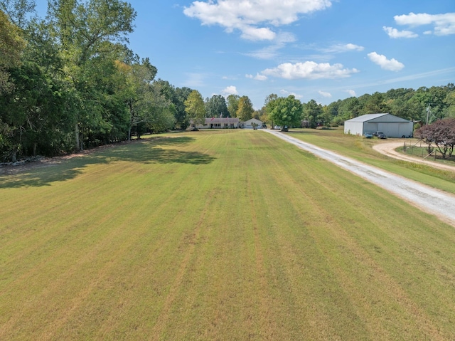 view of road with driveway